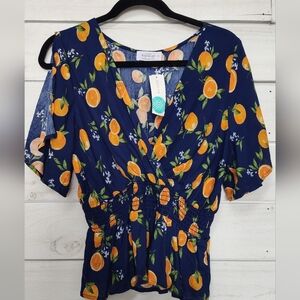 Kaileigh Blue and Orange Flutter Sleeve Blouse with Ruched Tie Front